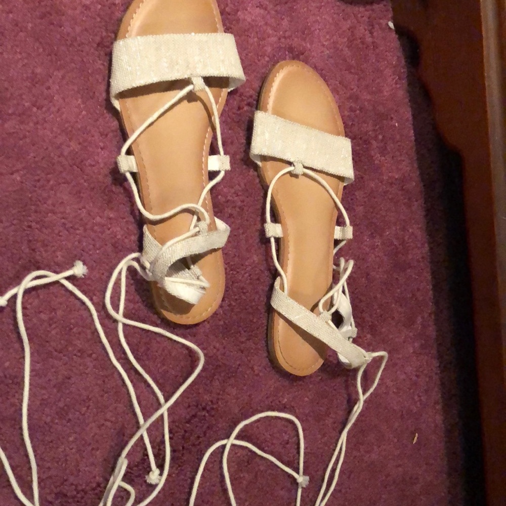 Cream sandals that tie around ankle